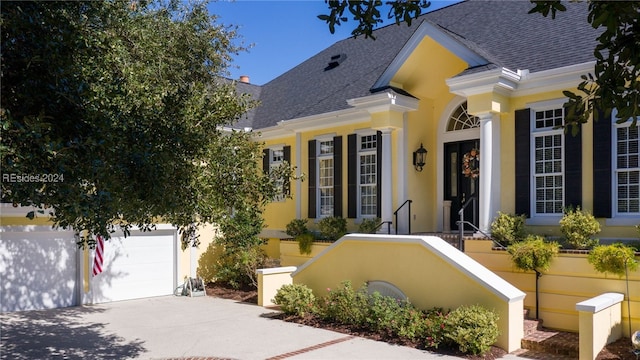 view of front of property featuring a garage