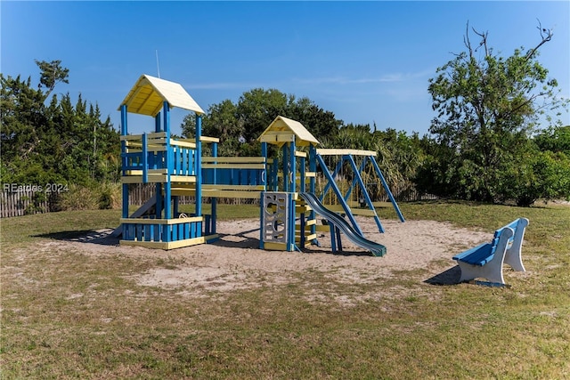 view of playground featuring a yard