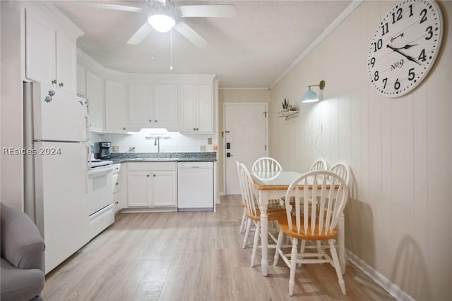 kitchen with sink, white appliances, crown molding, white cabinetry, and light wood-type flooring