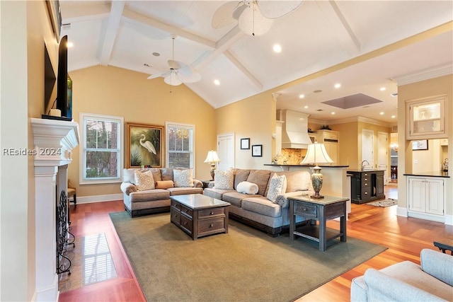 living room featuring sink, crown molding, ceiling fan, high vaulted ceiling, and wood-type flooring