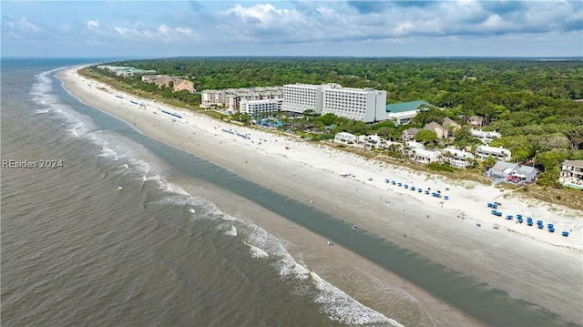 bird's eye view featuring a water view and a view of the beach