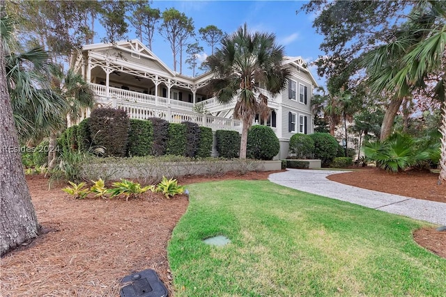 view of front of property with a front lawn