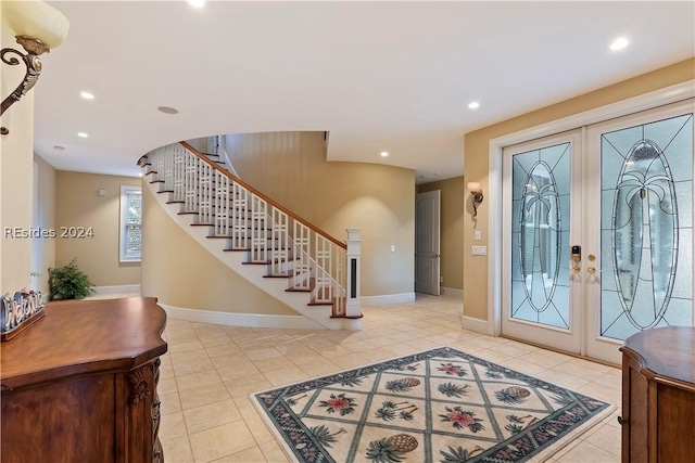 tiled entryway with french doors