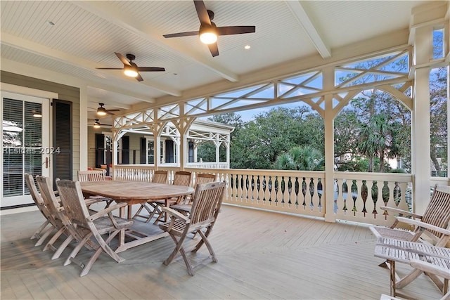 sunroom / solarium with beam ceiling