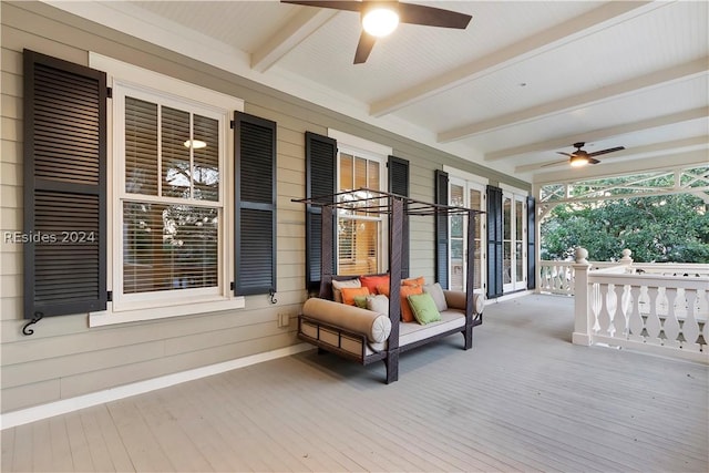 view of patio / terrace with ceiling fan and a porch