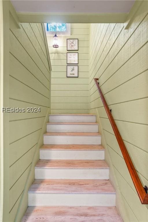 stairs with wooden walls