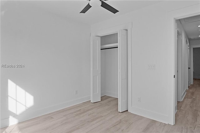 unfurnished bedroom featuring light hardwood / wood-style flooring and ceiling fan