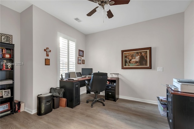 office space with hardwood / wood-style flooring and ceiling fan