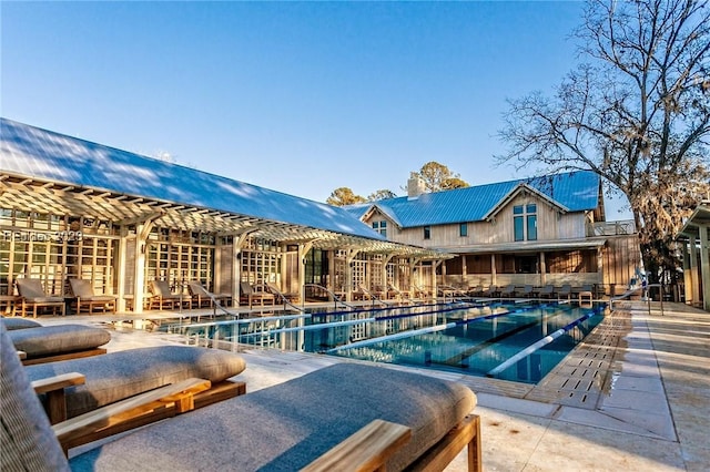 view of pool featuring a patio area