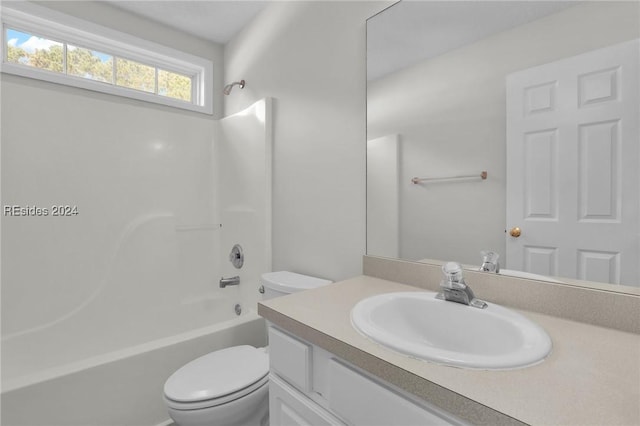 full bathroom featuring vanity, toilet, and shower / bathing tub combination