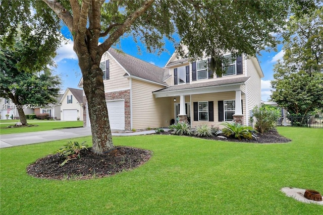 view of front of property with a porch, a garage, and a front yard