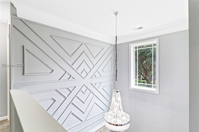 interior space with crown molding