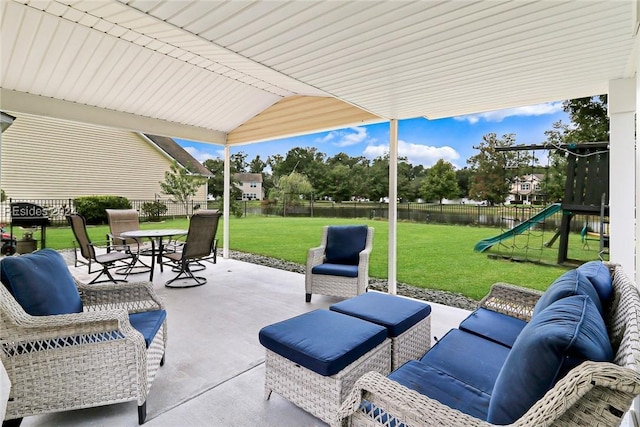 view of patio with outdoor lounge area and a playground