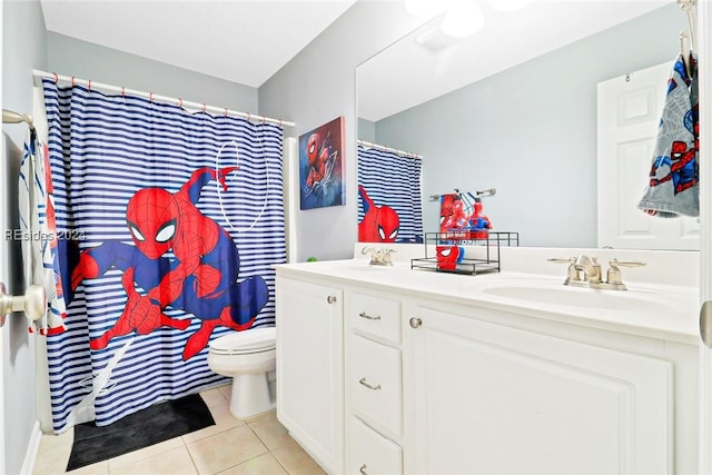 bathroom featuring vanity, curtained shower, tile patterned floors, and toilet