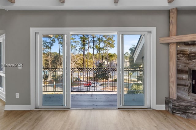 doorway to outside with light hardwood / wood-style flooring