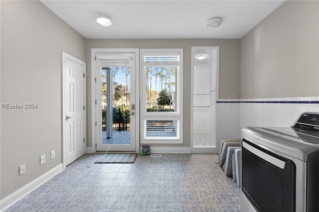 doorway with washer / dryer