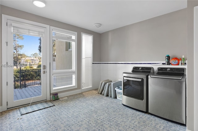 washroom featuring independent washer and dryer