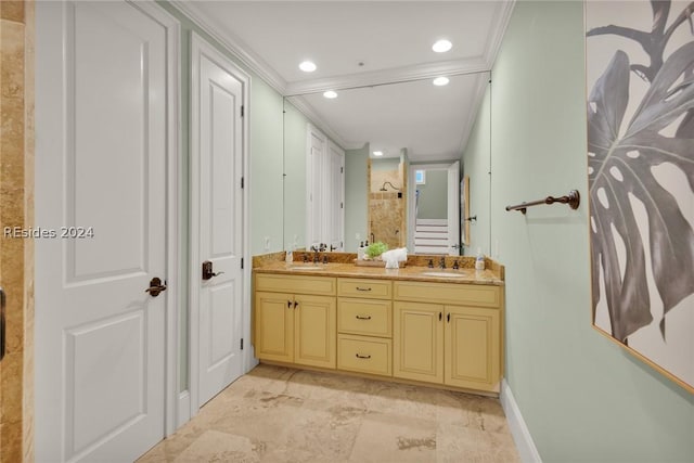 bathroom with ornamental molding, a shower, and vanity