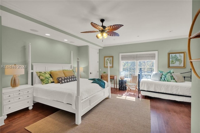 bedroom featuring crown molding, ceiling fan, and dark wood-type flooring