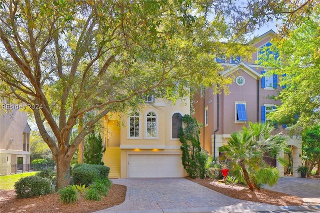 view of front of property featuring a garage