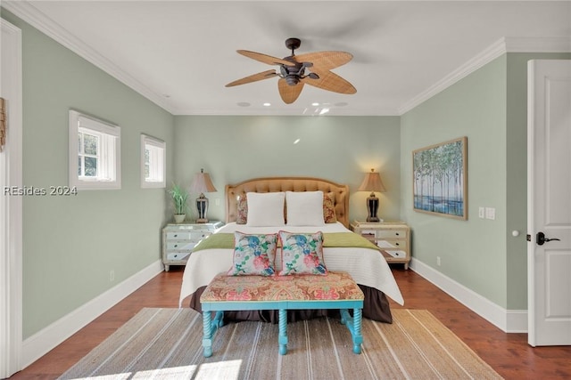 bedroom featuring hardwood / wood-style flooring, ceiling fan, and ornamental molding