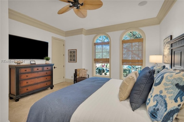 tiled bedroom featuring crown molding and ceiling fan