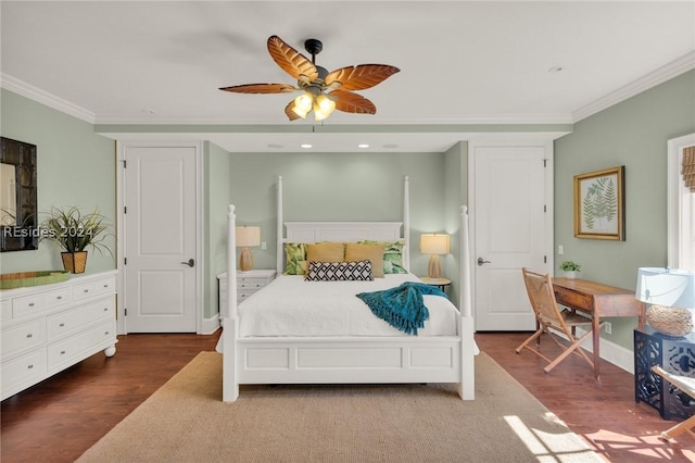 bedroom with ornamental molding, dark wood-type flooring, and ceiling fan