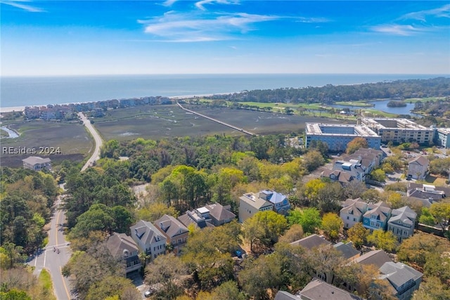 bird's eye view with a water view