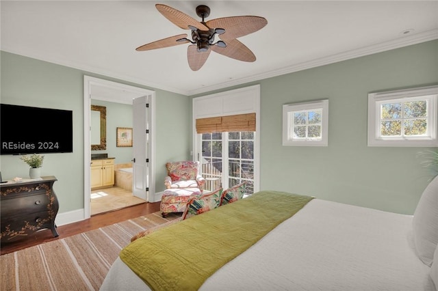 bedroom with light hardwood / wood-style flooring, ornamental molding, ceiling fan, and ensuite bathroom