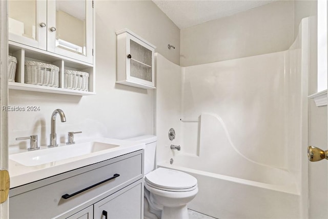 full bathroom featuring vanity, a textured ceiling, shower / tub combination, and toilet