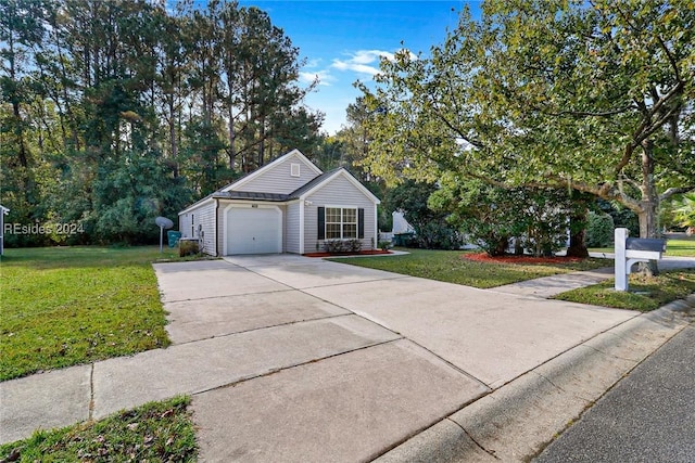 view of front of home featuring a garage and a front yard