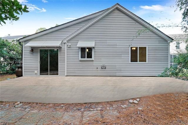 rear view of property with a patio