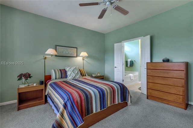 carpeted bedroom featuring ceiling fan and connected bathroom