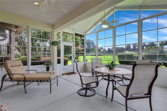 sunroom featuring vaulted ceiling with beams and ceiling fan