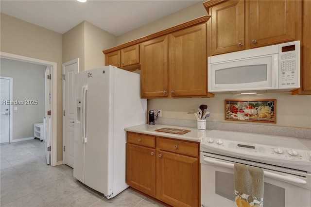 kitchen featuring white appliances