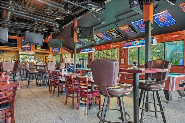 interior space featuring indoor bar