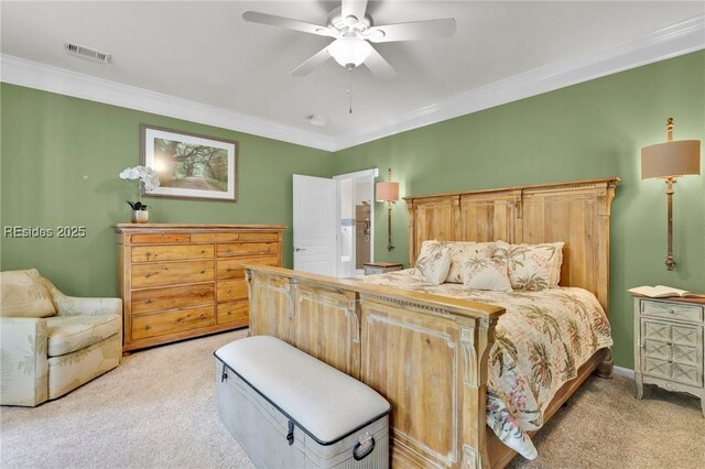 bedroom featuring crown molding, ceiling fan, and light colored carpet