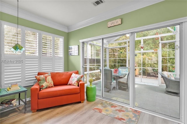 sunroom / solarium featuring plenty of natural light