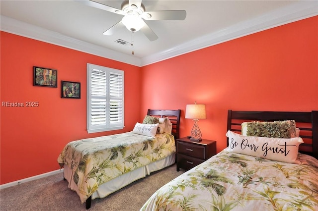 carpeted bedroom featuring ornamental molding and ceiling fan