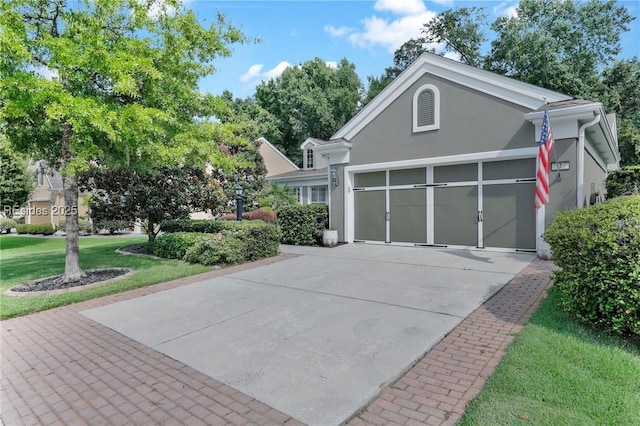 garage featuring a yard