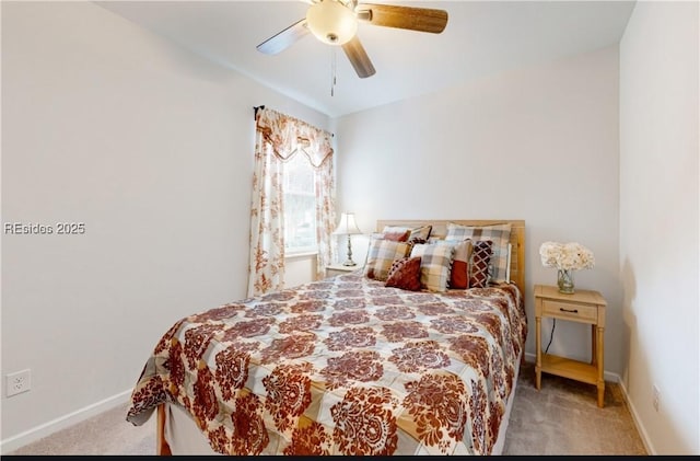 bedroom with light carpet and ceiling fan