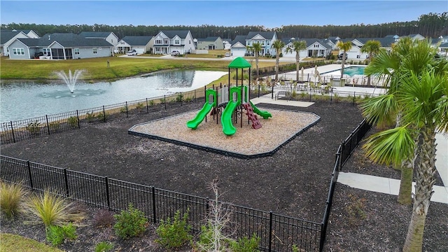 view of playground featuring a water view