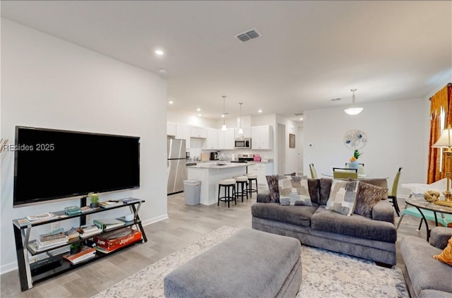 living room featuring light hardwood / wood-style floors