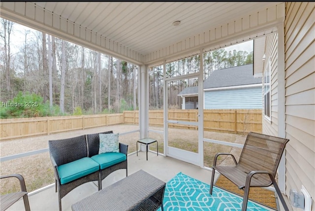 sunroom featuring a healthy amount of sunlight