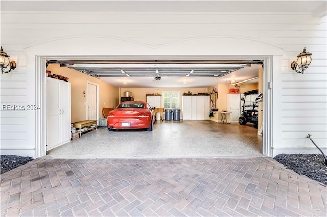 garage featuring a garage door opener