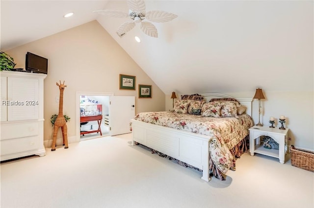 carpeted bedroom with vaulted ceiling and ceiling fan