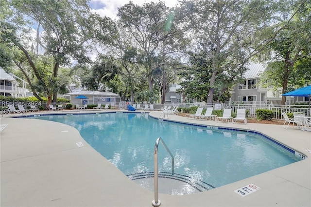 view of swimming pool featuring a patio