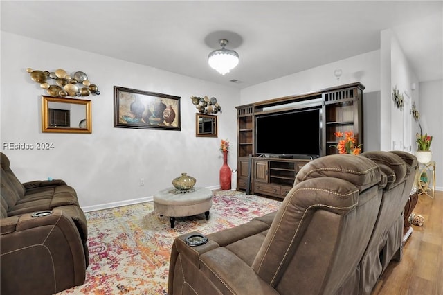 living room with light hardwood / wood-style flooring