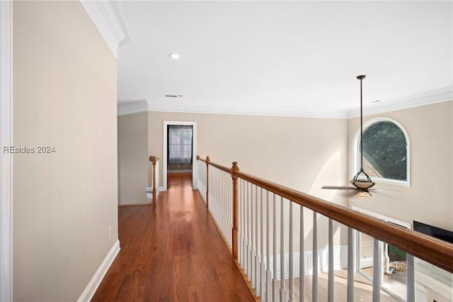 hall featuring crown molding and wood-type flooring