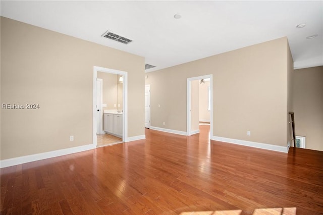 unfurnished room with light hardwood / wood-style flooring